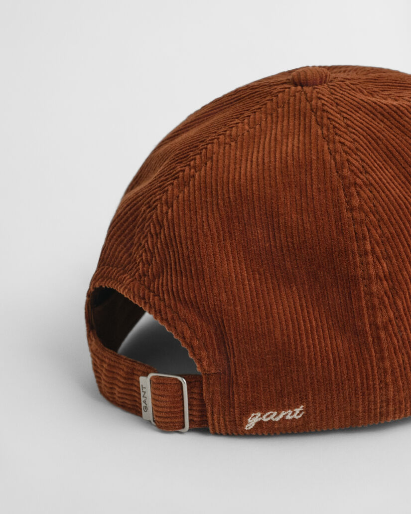 Corduroy pet met G-badge