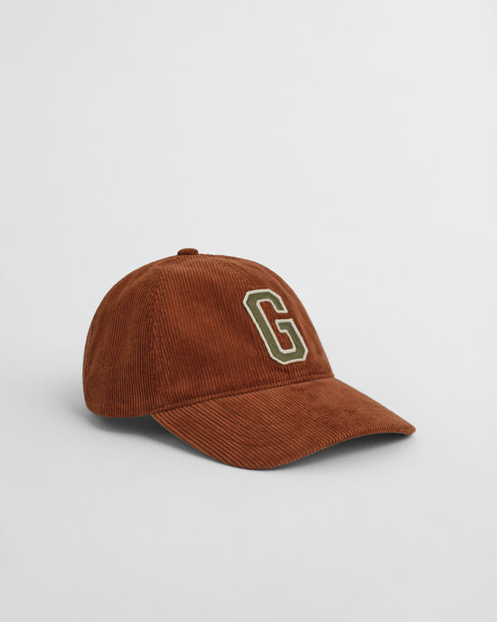 Corduroy pet met G-badge