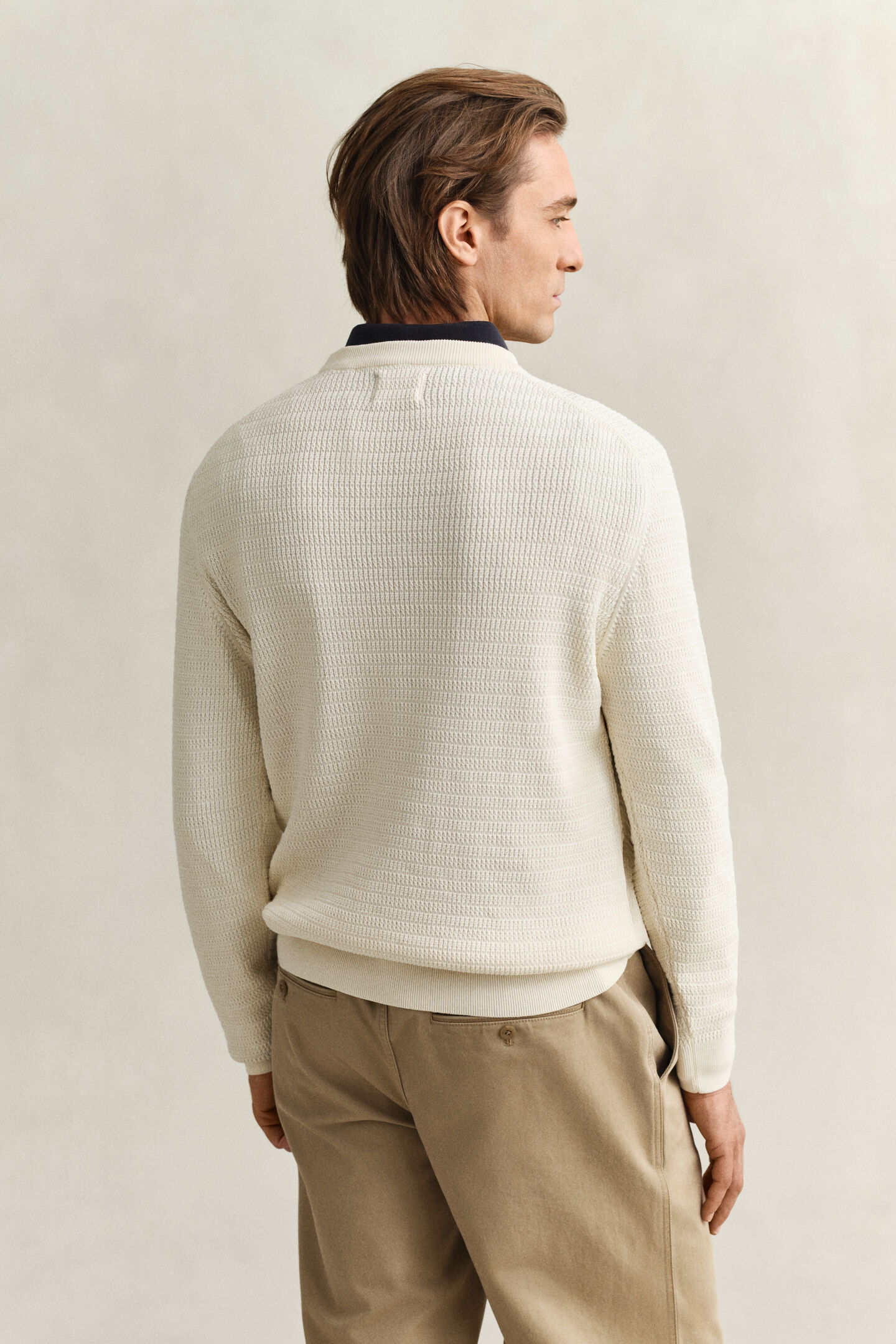 Gebreide trui met minikabels en ronde hals