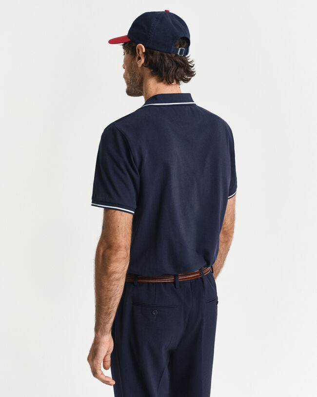 Piqu&eacute; poloshirt met randdetails