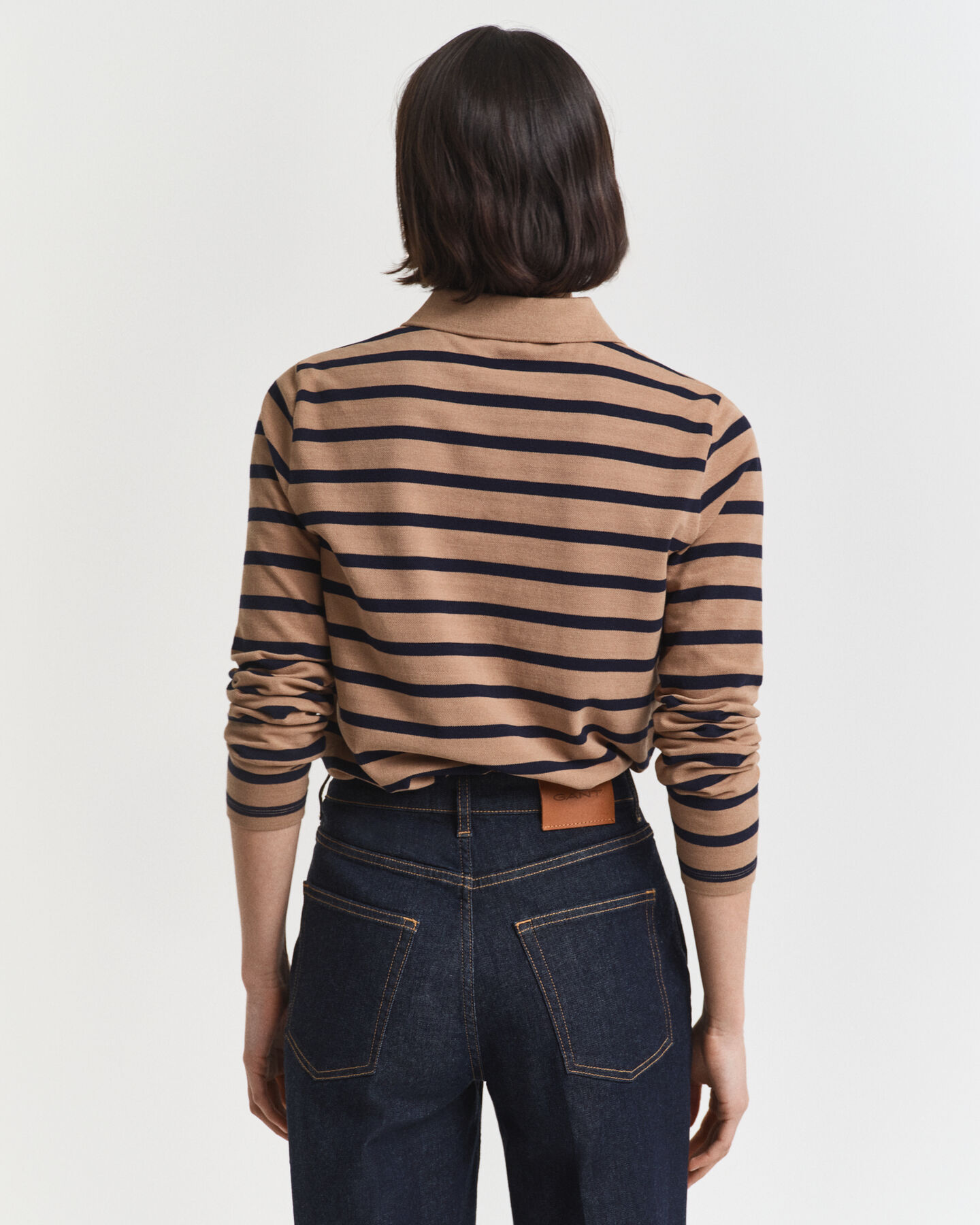 Piqu&eacute; poloshirt met lange mouwen en Bretonse streep