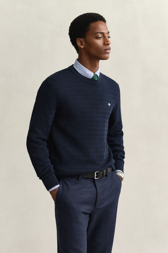 Gebreide trui met minikabels en ronde hals