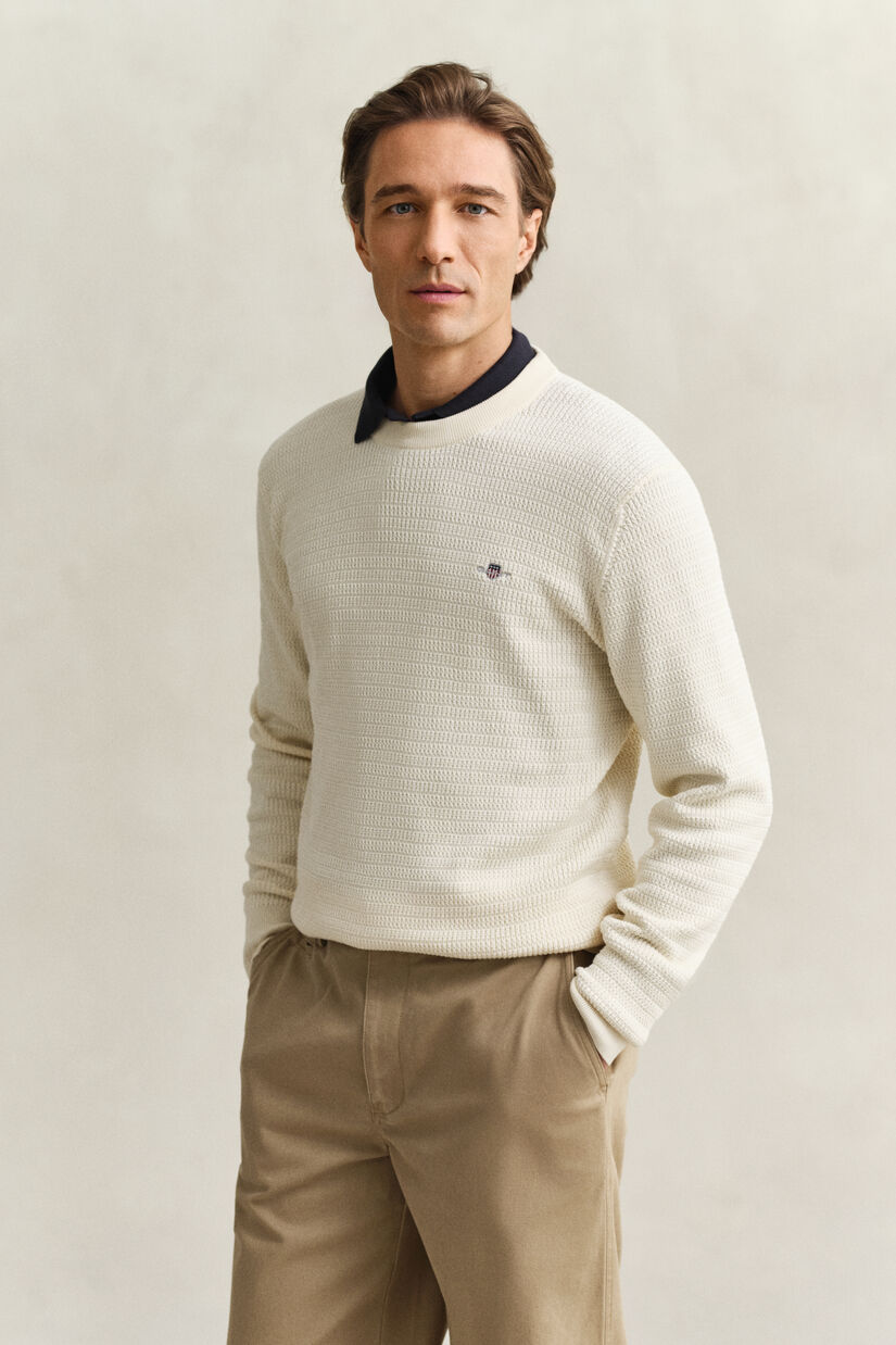 Gebreide trui met minikabels en ronde hals