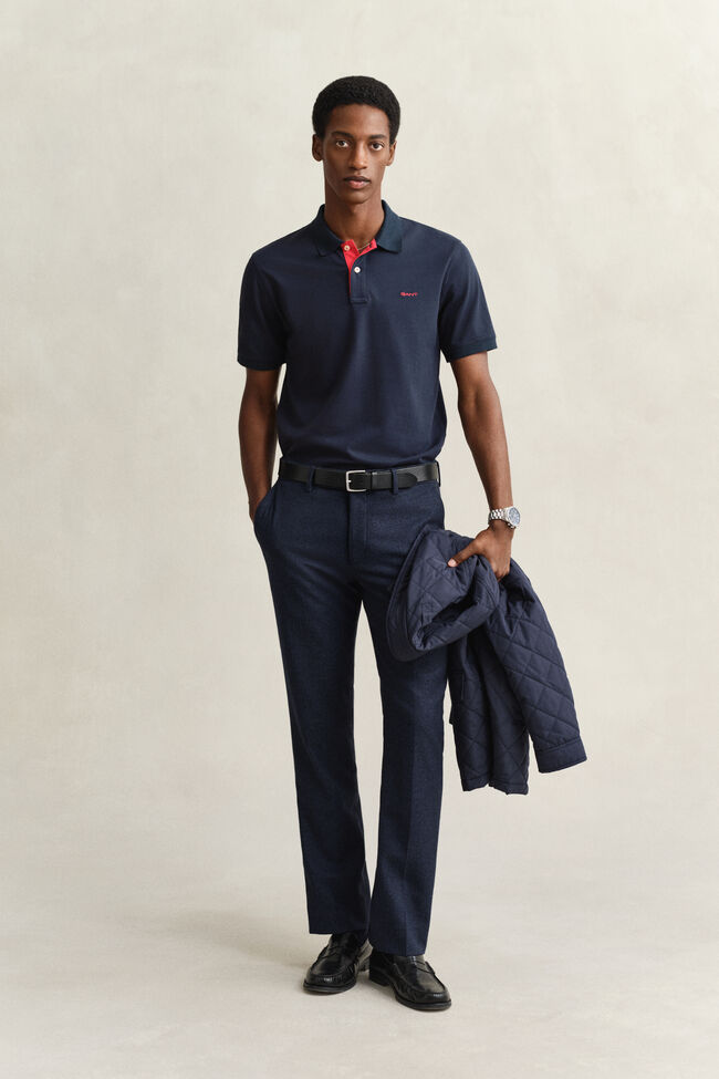 Piqu&eacute; poloshirt met contrasterend detail