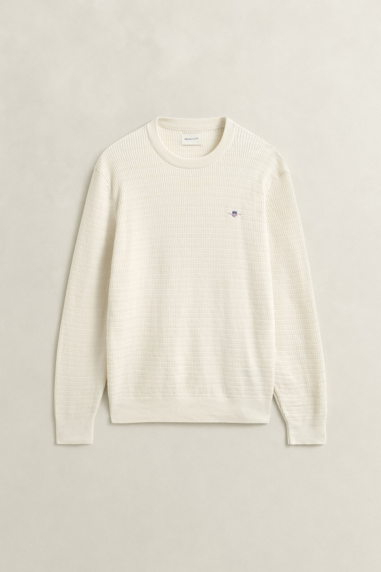 Gebreide trui met minikabels en ronde hals