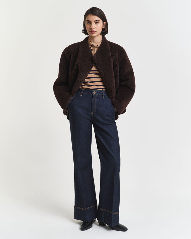 Piqu&eacute; poloshirt met lange mouwen en Bretonse streep