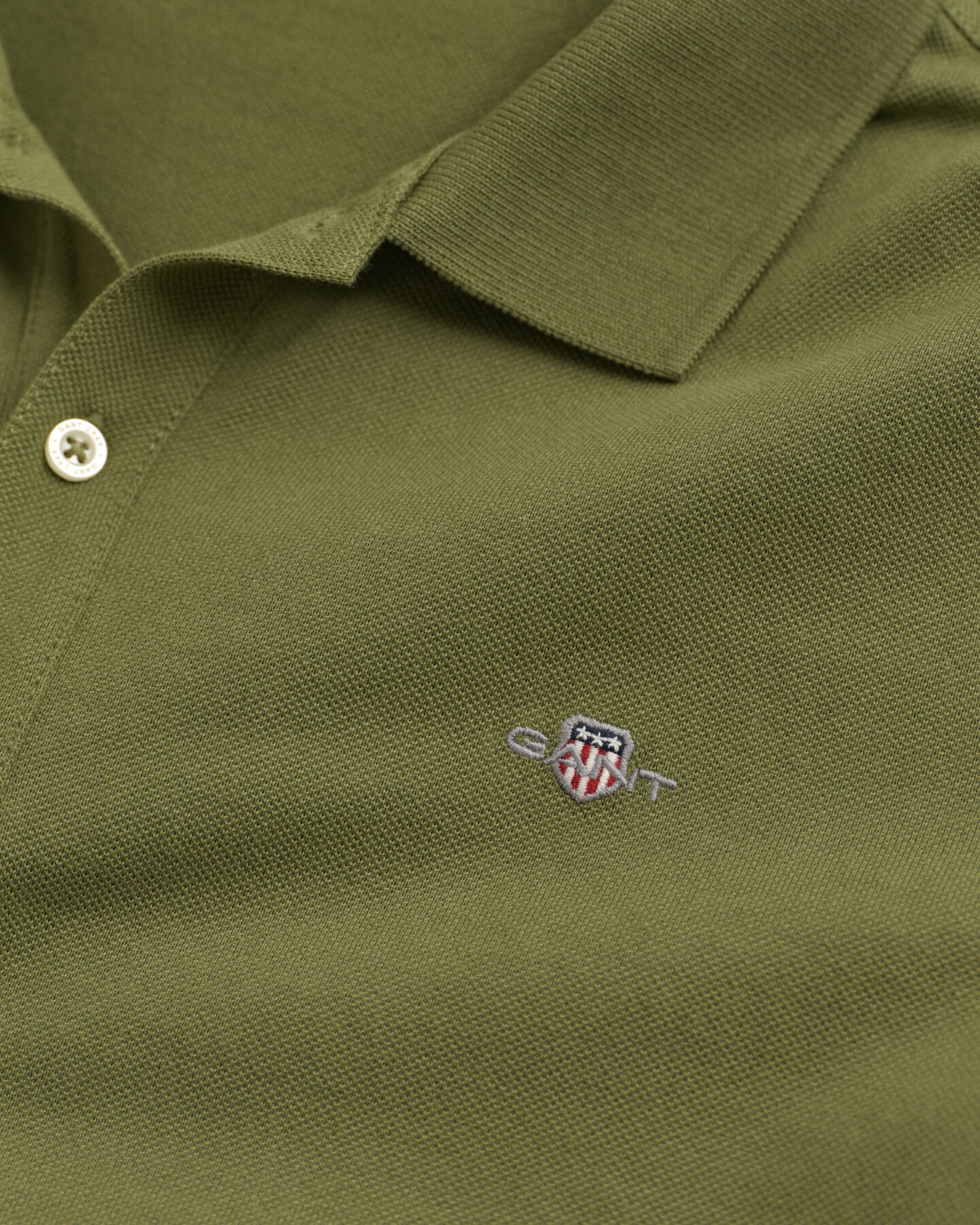 Teens Shield piqu&eacute; poloshirt