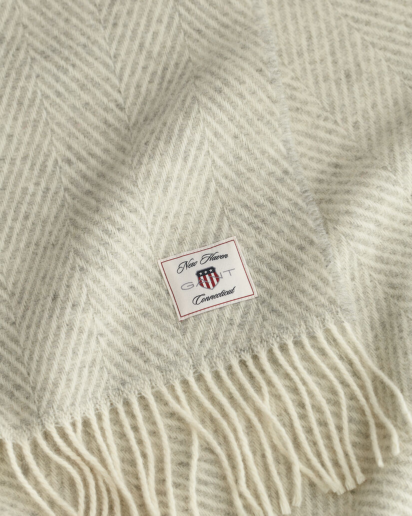 Wollen sprei met visgraatmotief