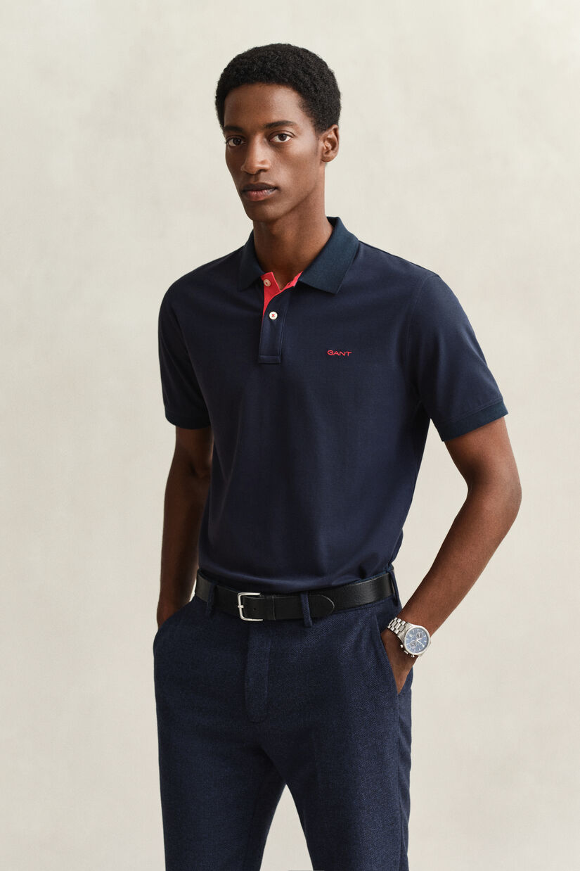 Piqu&eacute; poloshirt met contrasterend detail