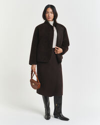 Halflange, handgestikte wikkelrok